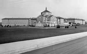 Campus scene showing St. Joseph's Provincial House and grounds. At the time of the move to the Provincial House, the grounds had little landscaping; Sisters remembered getting red mud on their shoes when they went for walks.