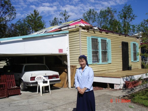 Sister Catarina Chu (Province of St. Elizabeth Ann Seton) outside a home in Bayou La Batre, AL