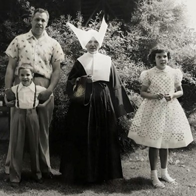 Photo of Sister Baptistine Massa with three family members