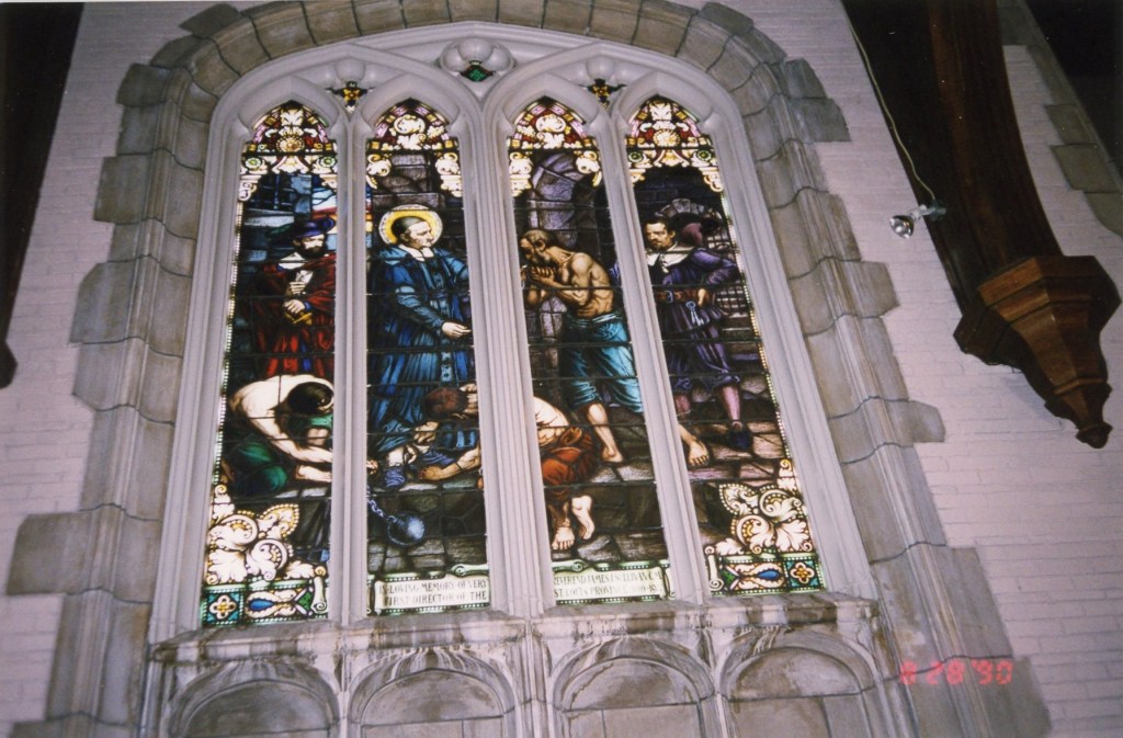 Stained Glass window of St. Vincent de Paul in the Galleys at Marillac Chapel. Taken August 28, 1990.